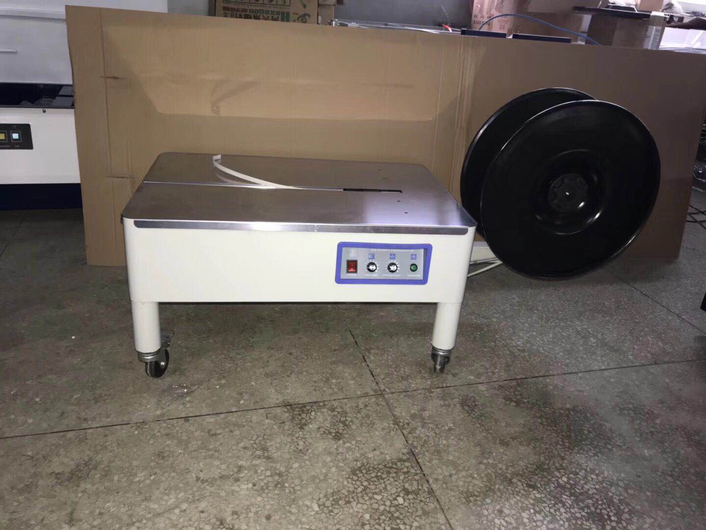 半自动低台打包机_纸箱打包机_半自动低台打包机维修