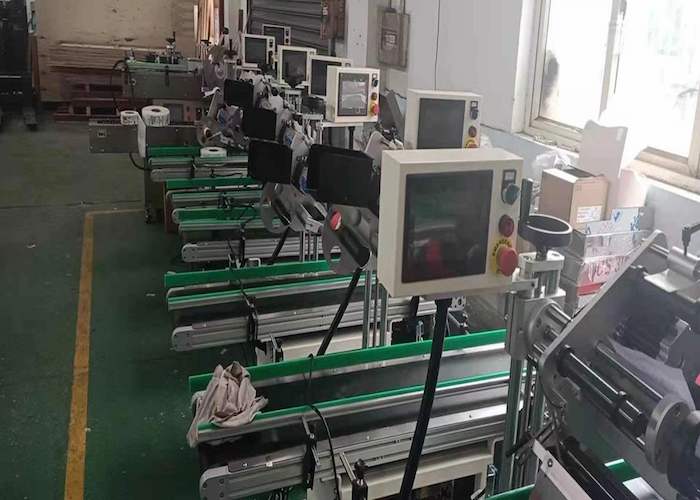 全自动实时打印贴标机使用方法_面单贴标机配件_贴标机维修
