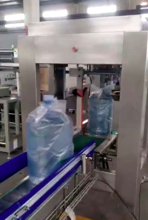 五升桶装水套膜机-桶装水无人套袋机修理-盐城全自动提桶套袋机